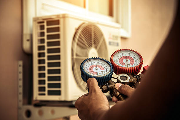 Professional Ductwork Repair technician working in Mansfield, PA